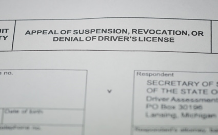 Paper copy of a legal document that's titled Appeal of Suspension, Revocation, or Denial of Driver's License from the State of Michigan Judicial Circuit County
