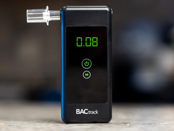 Device used to obtain someone's blood alcohol content (BAC) reading [insert number] which is the BAC limit for a standard OWI charge in Michigan